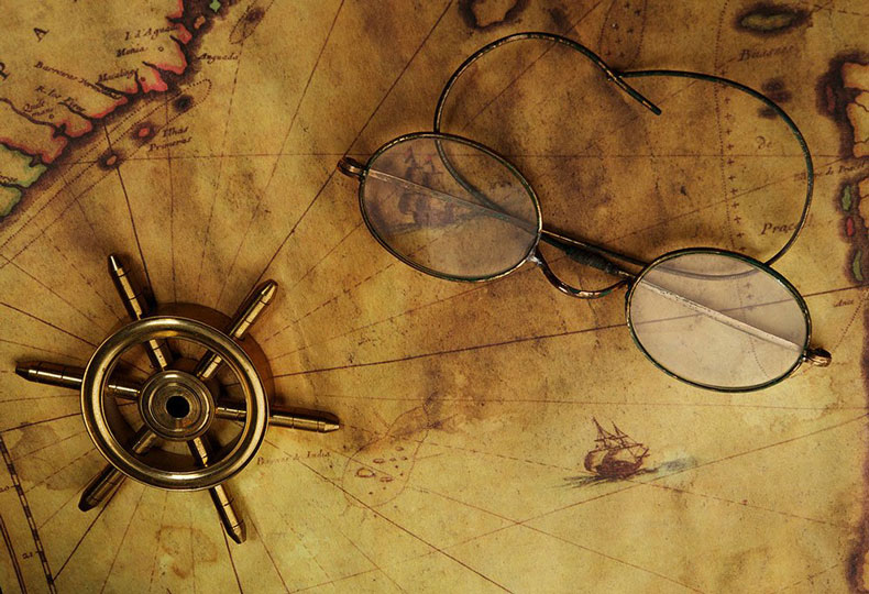 featured image for best bifocals, with some glasses on a map